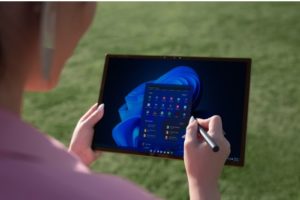 woman drawing on tablet